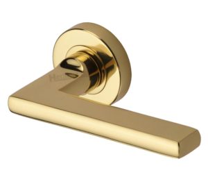 Heritage Brass Trident Polished Brass Door Handles On Round Rose (sold in pairs)