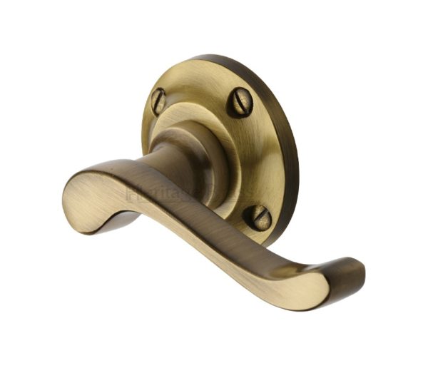 Heritage Brass Bedford Antique Brass Door Handles On Round Rose (sold in pairs)