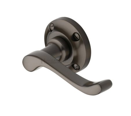 Heritage Brass Bedford Matt Bronze Door Handles On Round Rose (sold in pairs)