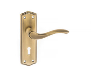 Old English Warwick Key Lever Door Handle on Backplate - Matt Antique Brass